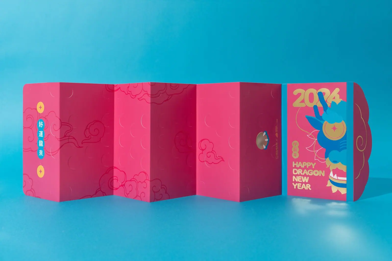 Fortune Dragon red packet fully unfolded across six panels, showing die-cut dragon scales and gold foil craft