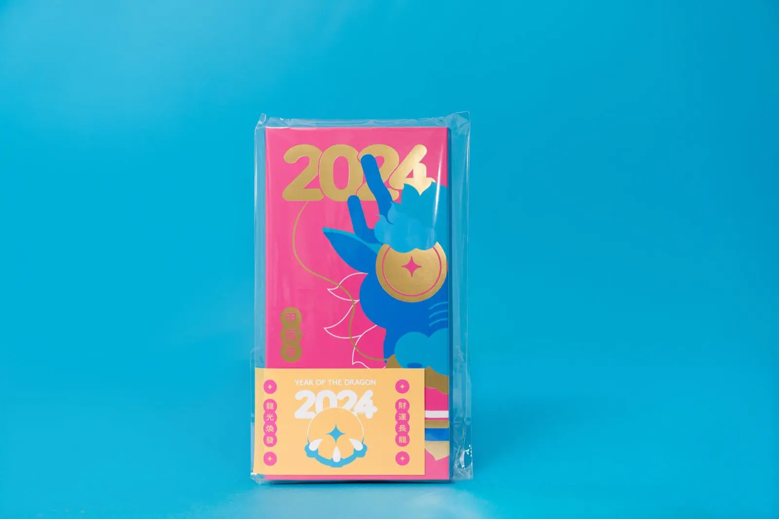 Complete packaging for the Fortune Dragon red packet, with clear wrap and a hang tag