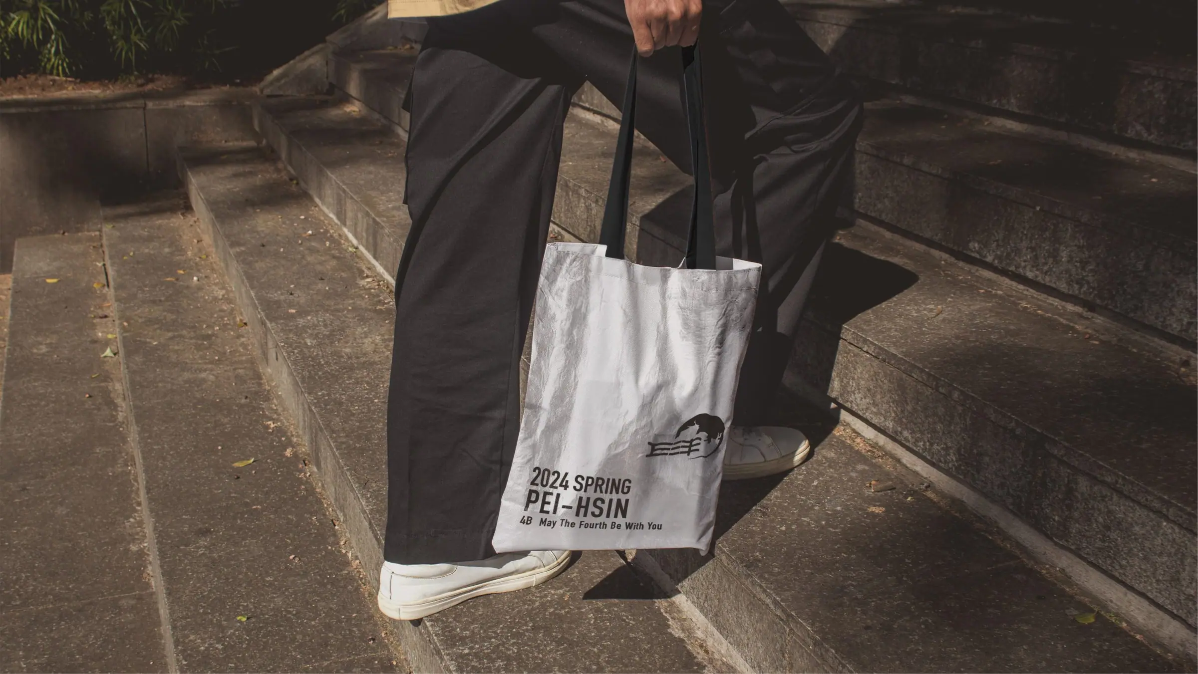 NTU E-Force graduation trip commemorative canvas tote bag styled in an outfit setting