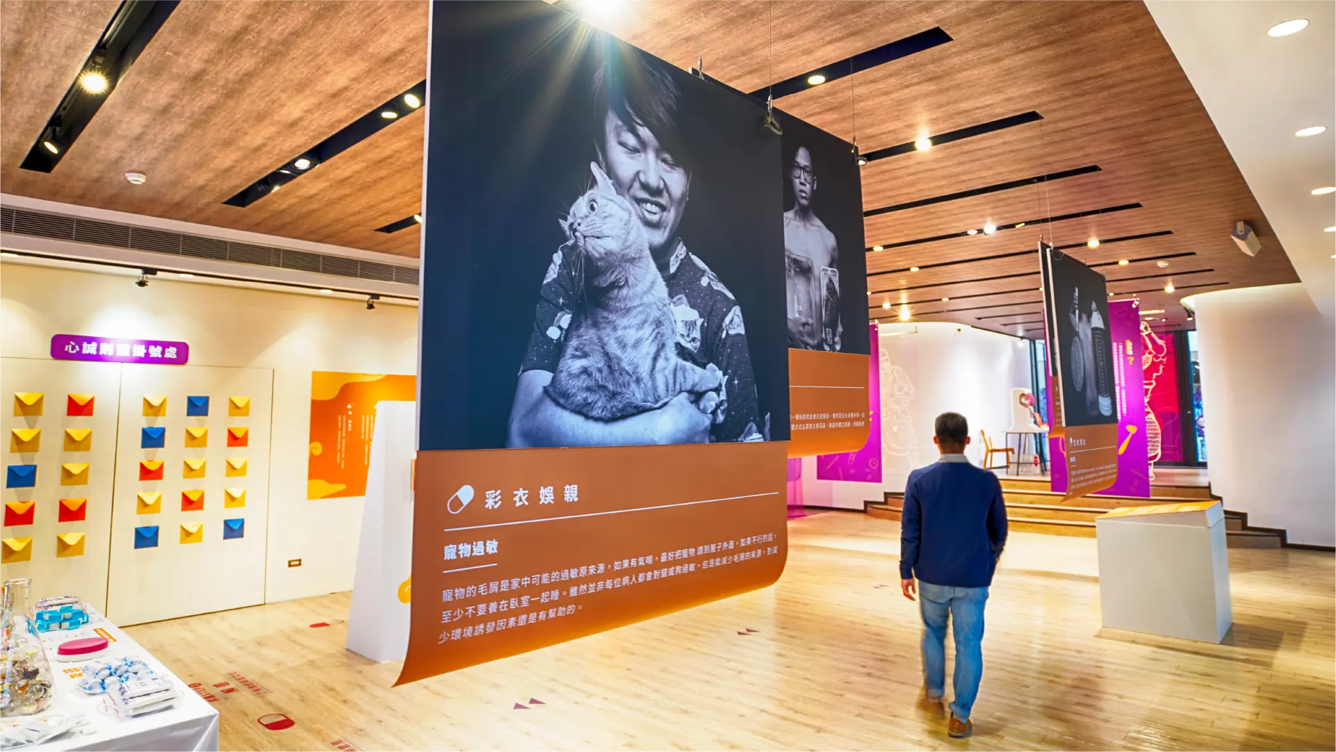 Exhibition corridor visual wall at the Sincere Faith Heals exhibition, featuring door god imagery